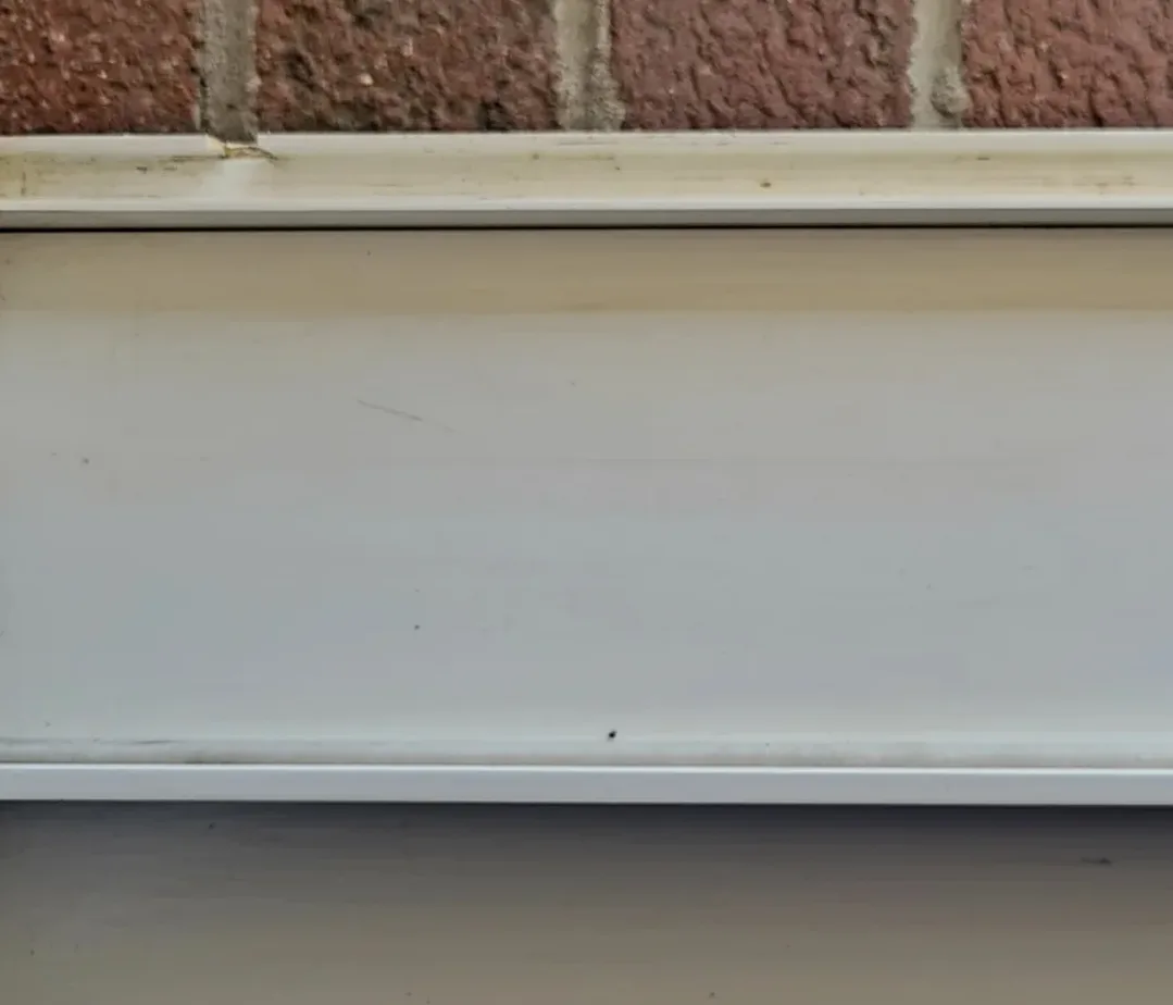 Same window track spotless and like-new after Down to Earth service